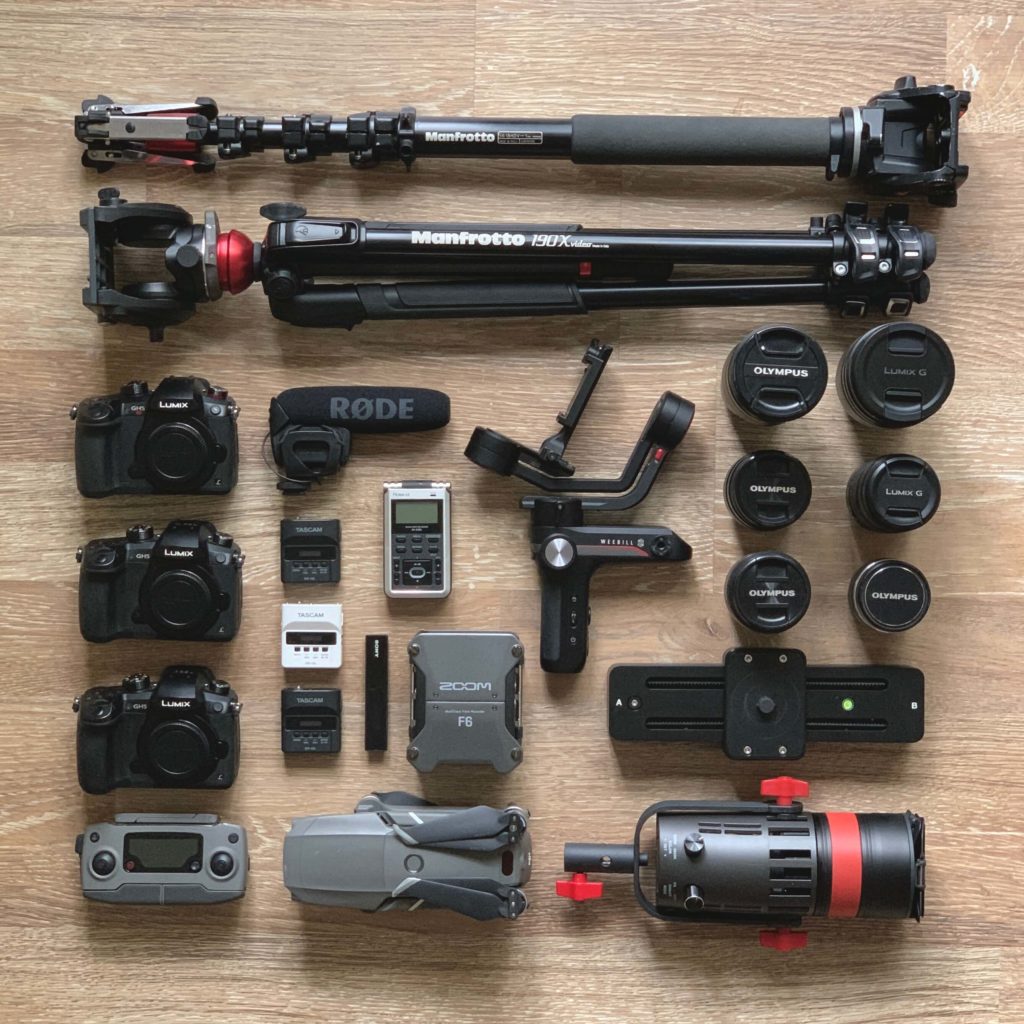 A flat lay of the wedding videography equipment used by Luxe Filmography.